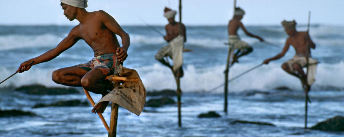 Weligama, South coast, Sri Lanka, 1995."Fishermen along the southern coast of Sri Lanka cast their lines in the traditional way atop poles so they can work in shallow water without disturbing the fish."  - George Eastman HouseThe theatrical stage would not offer a finer gesture, nor a more equisite doubling between the near and the far, than does this picture.  McCurry captures the beauty of a cultural tradition and with it a natural choreography.  This image also preserves a practice now essentially lost to technology, having all but disappeared in the intervening years since the photograph was made.  -Anthony Bannon

Magnum Photos, NYC5948; MCS1995006K200, Phaidon, 55, South Southeast, Iconic Images, final book_iconic